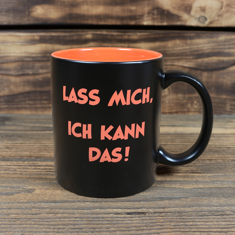 Tasse schwarz mit orangener Innenseite